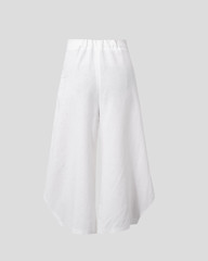 sculptural round hem detail on red linen pants