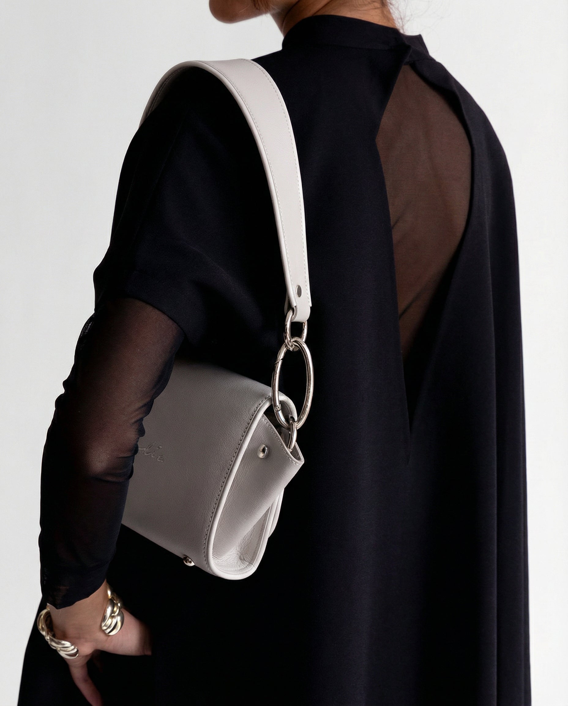 Modern black cape with sheer back detail