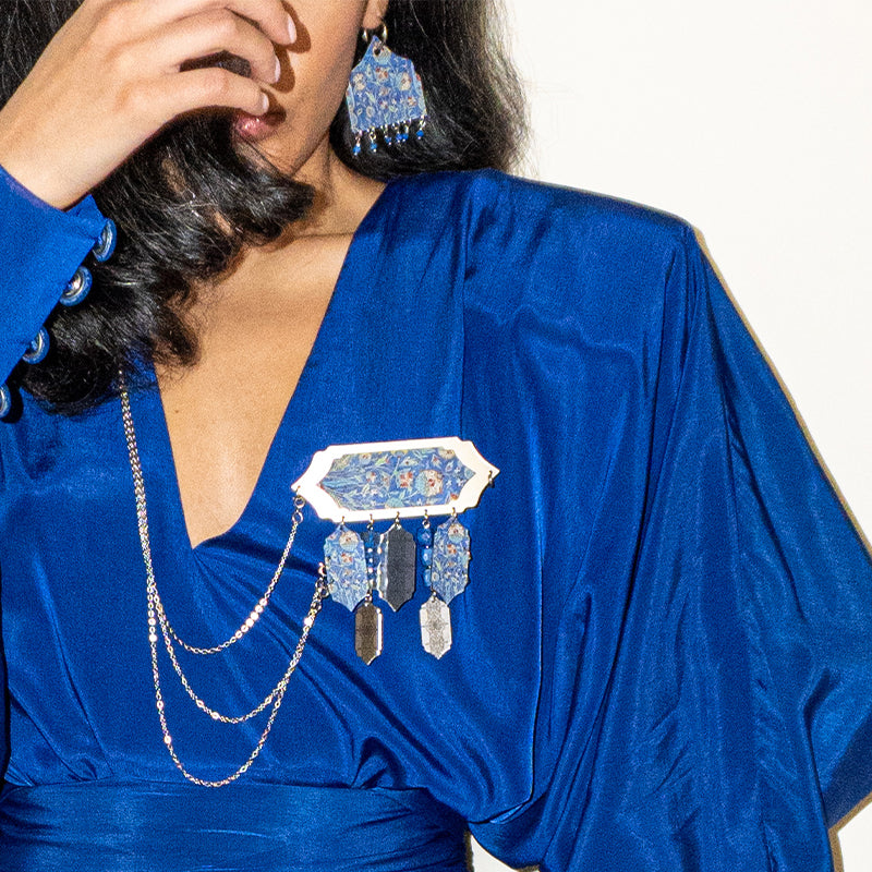 Handcrafted ear cuff brooch in blue and silver