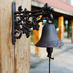 Vintage cast iron wall bell for outdoor decor