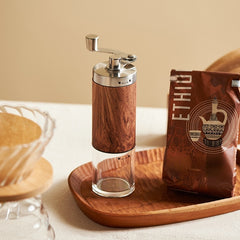 Hand grinder with wood grain finish for spices or coffee